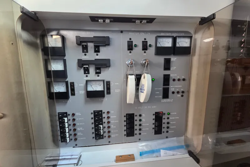 Slide: The Image of Electrical control panel on a 1991 Sea Ray 420 Sundancer boat. - 20