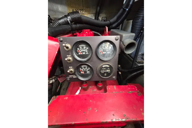 Slide: The Image of Control panel of a 1991 Sea Ray 420 Sundancer boat engine. - 31