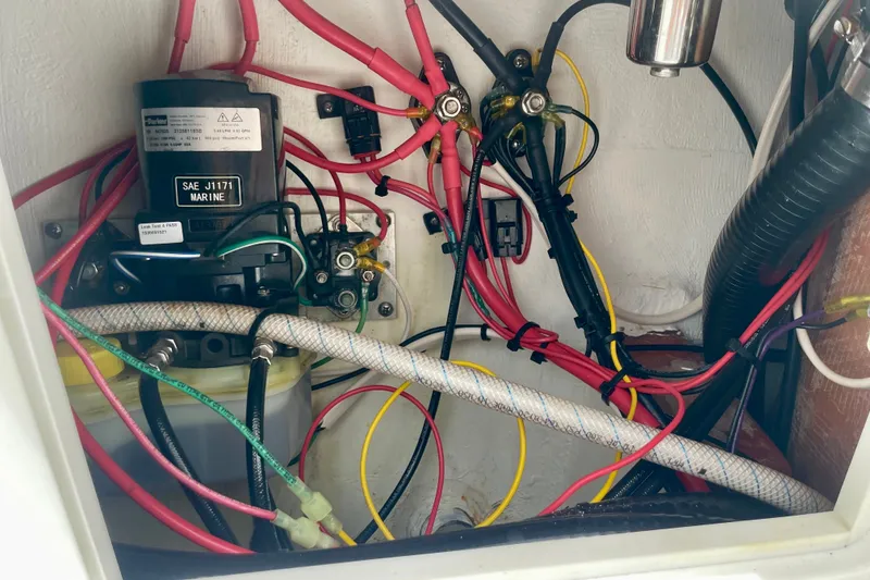 Slide: The Image of Electrical wiring and components inside a 2022 Dorado 25 FD boat. - 28