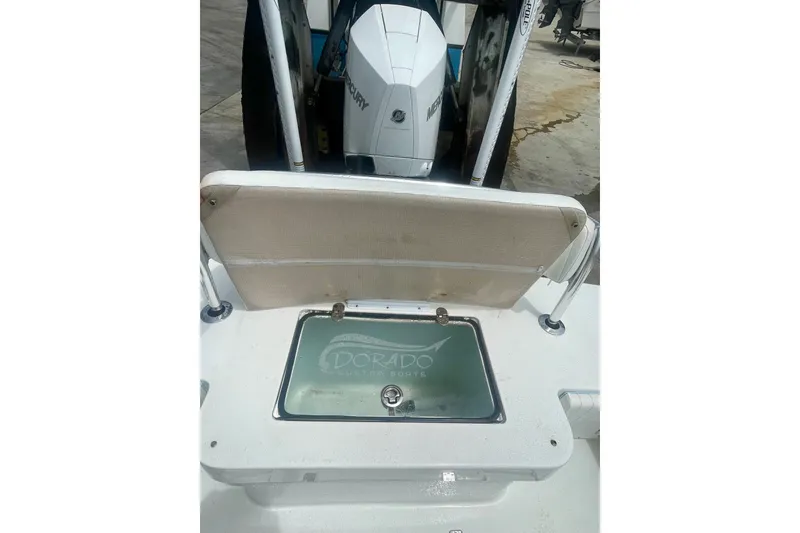 Slide: The Image of 2022 Dorado 25 FD boat with Mercury engine and custom sports logo. - 26