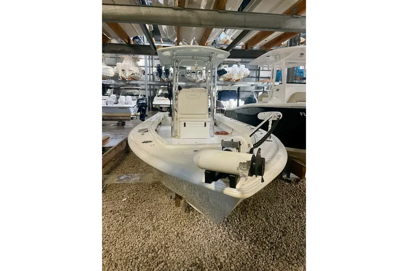 Slide: The Image of 2022 Dorado 25 FD boat in storage, featuring sleek design and modern equipment. - 30