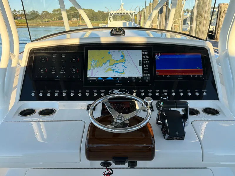 Slide: The Image of The 2026 Valhalla V-41 cockpit features a modern helm with digital displays and a chartplotter. - 39