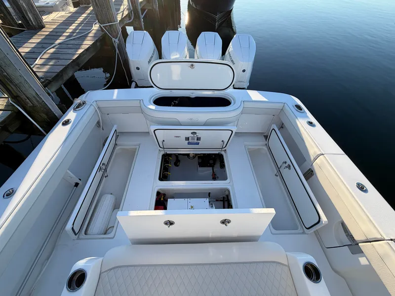 Slide: The Image of The image shows the cockpit of a 2026 Valhalla V-41 boat with multiple storage compartments. - 27
