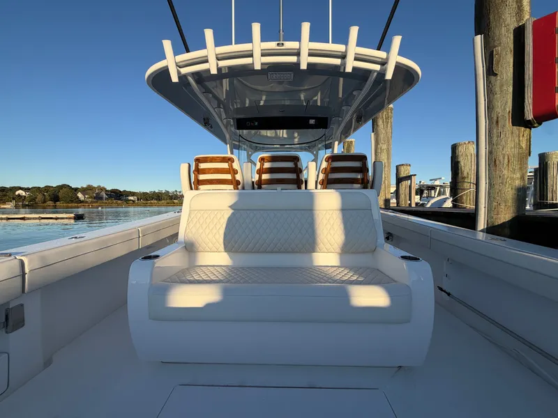 Slide: The Image of The image shows the cockpit of a Valhalla V-41 boat with sleek seating and a modern helm. - 35