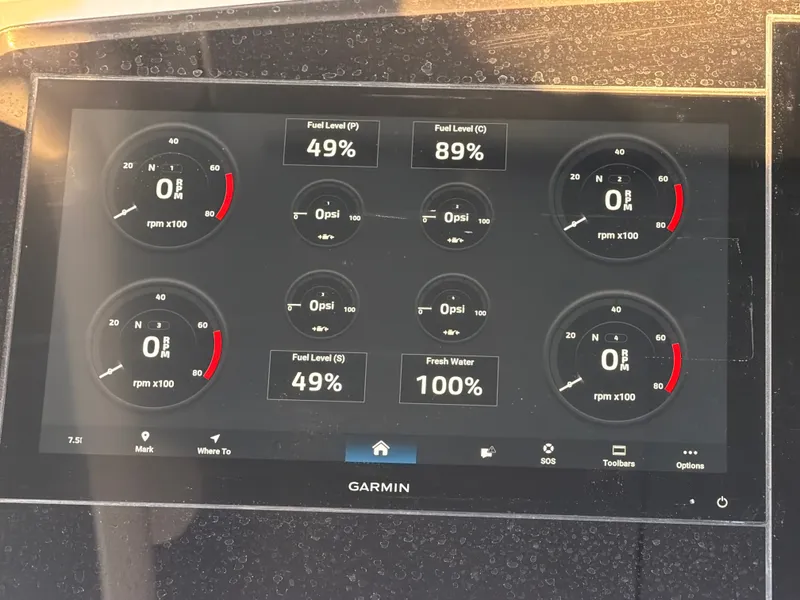 Slide: The Image of A Garmin display shows fuel and water levels along with engine data. - 40