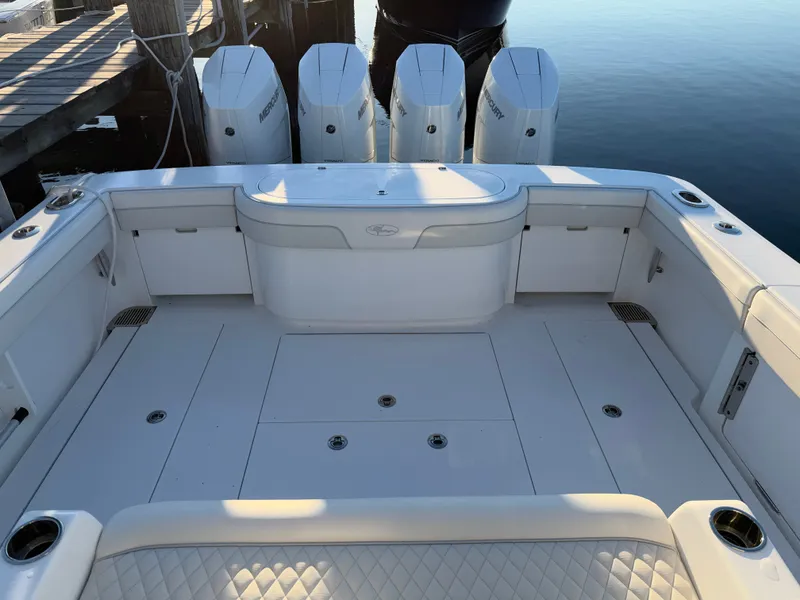 Slide: The Image of The image shows the spacious cockpit of a Valhalla V-41 boat with four outboard engines. - 26