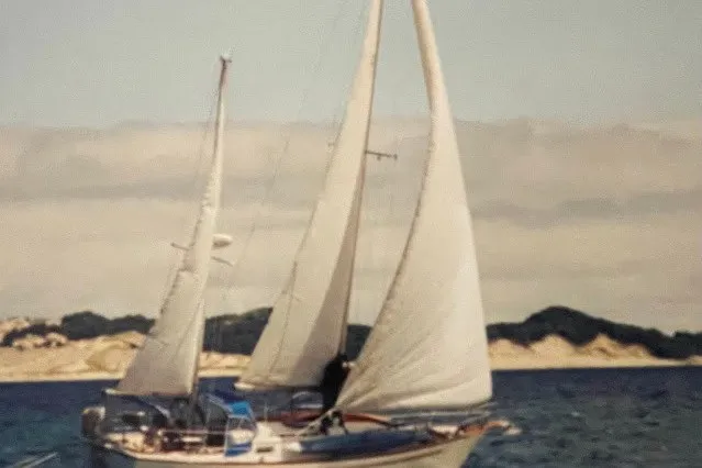 Slide: The Image of 1984 Robert Perry Nassau Tatoosh 42 sailboat cruising on open water. - 15