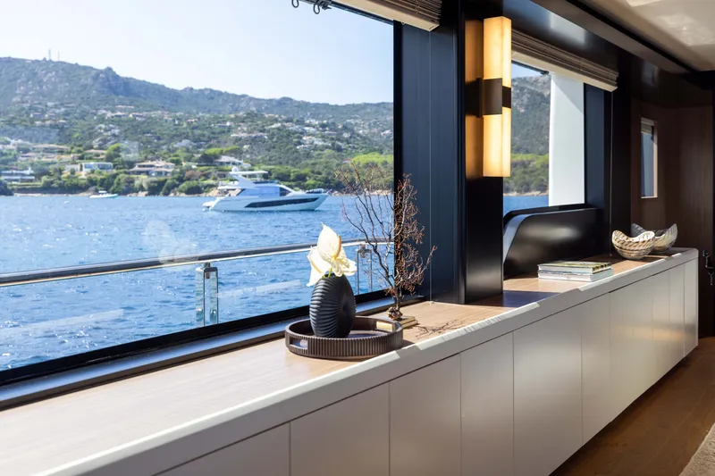 Slide: The Image of Luxurious interior of 2025 Alpha 100 Squalo yacht with scenic ocean view. - 23