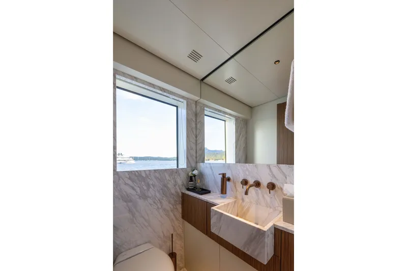 Slide: The Image of Luxurious bathroom with marble sink and ocean view on Alpha 100 Squalo yacht, 2025 model. - 40
