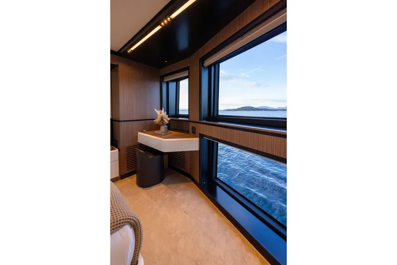 Slide: The Image of Luxurious interior of 2025 Alpha 100 Squalo yacht with ocean view windows. - 39