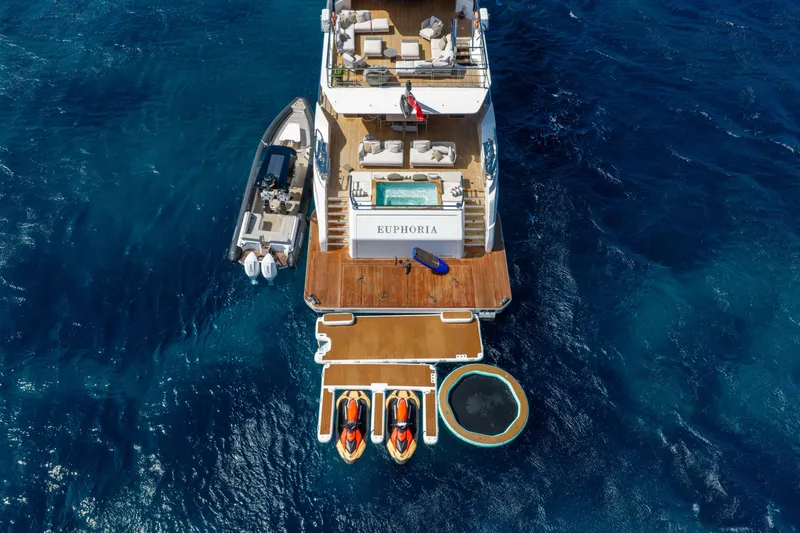 Slide: The Image of Aerial view of luxury yacht Alpha 100 Squalo 2025 with jet skis and pool. - 13