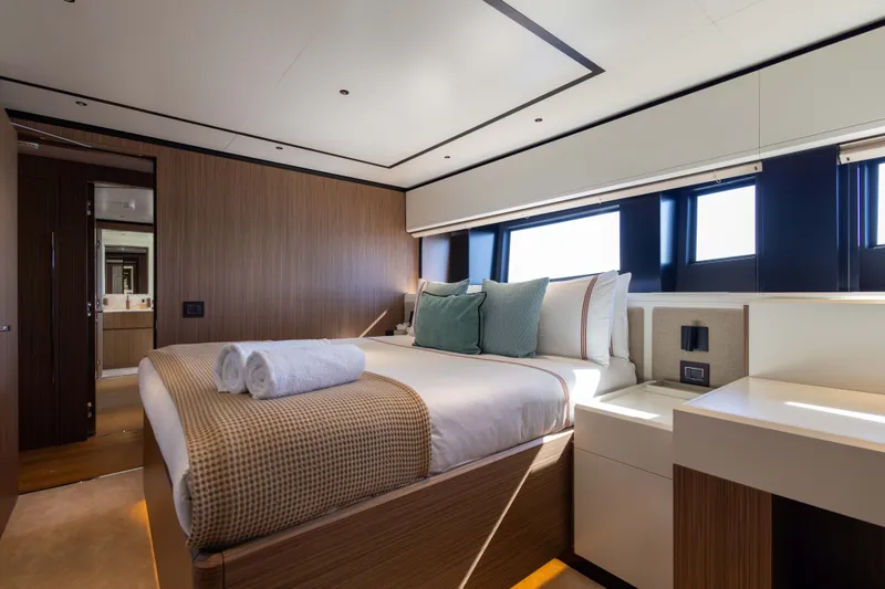 Slide: The Image of Luxurious bedroom interior on 2025 Alpha 100 Squalo yacht, featuring modern design and elegant furnishings. - 61