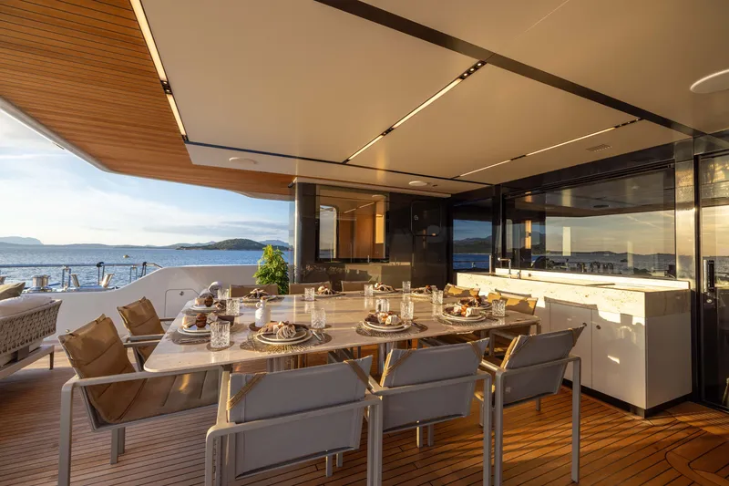 Slide: The Image of Luxurious dining area on 2025 Alpha 100 Squalo yacht with ocean view. - 48