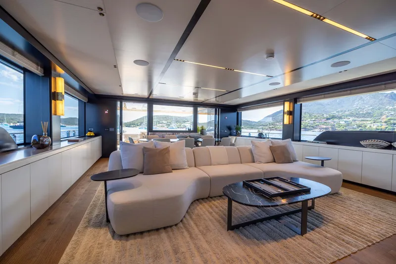 Slide: The Image of Luxurious interior of 2025 Alpha 100 Squalo yacht with modern furnishings and panoramic windows. - 26