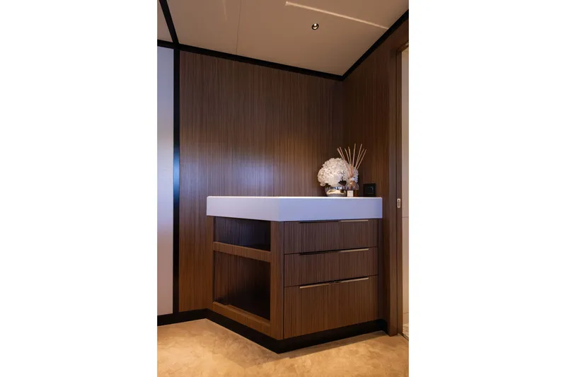 Slide: The Image of Luxurious wooden cabinet with modern decor in Alpha 100 Squalo, 2025 model yacht interior. - 59