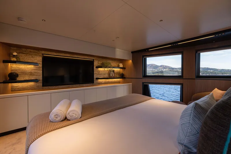 Slide: The Image of Luxurious bedroom interior of 2025 Alpha 100 Squalo yacht with scenic ocean view. - 38