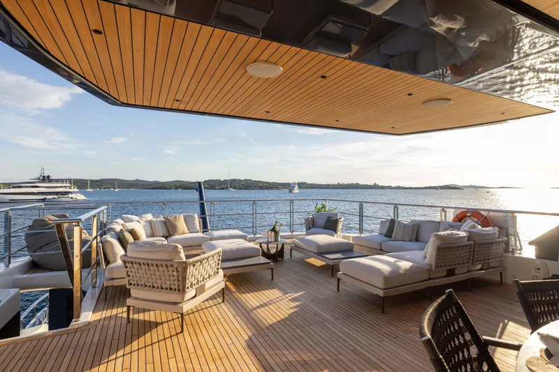 Slide: The Image of Luxurious deck of 2025 Alpha 100 Squalo yacht with elegant seating and ocean view. - 55