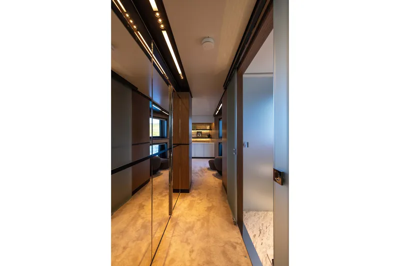 Slide: The Image of Luxurious interior hallway of 2025 Alpha 100 Squalo yacht, featuring modern design and ambient lighting. - 43
