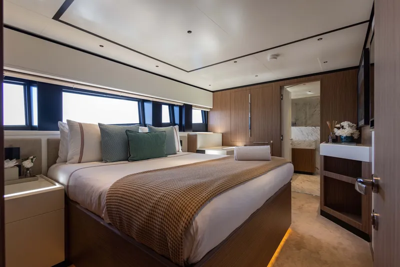 Slide: The Image of Luxurious bedroom interior of 2025 Alpha 100 Squalo yacht, featuring elegant design and modern amenities. - 62