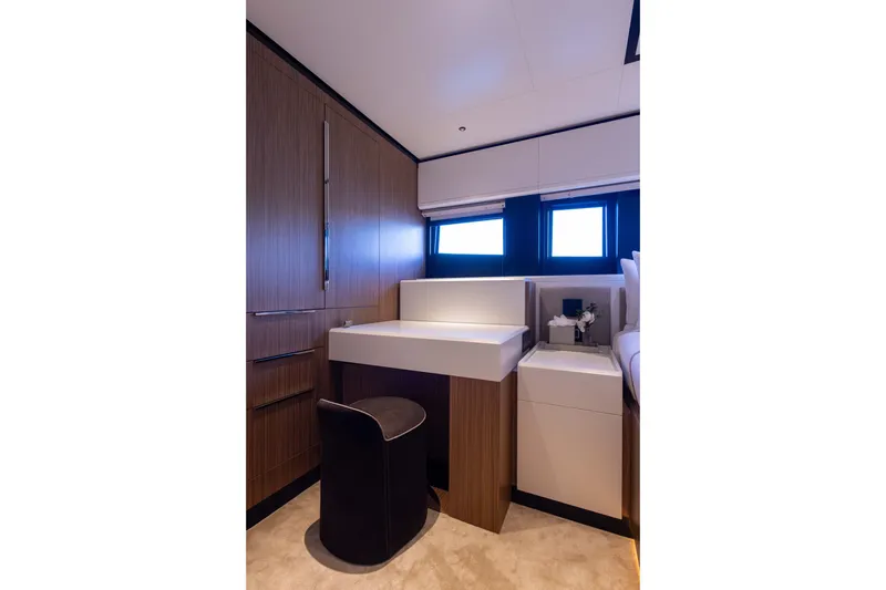 Slide: The Image of Luxurious interior of 2025 Alpha 100 Squalo yacht with modern wood and white design. - 60