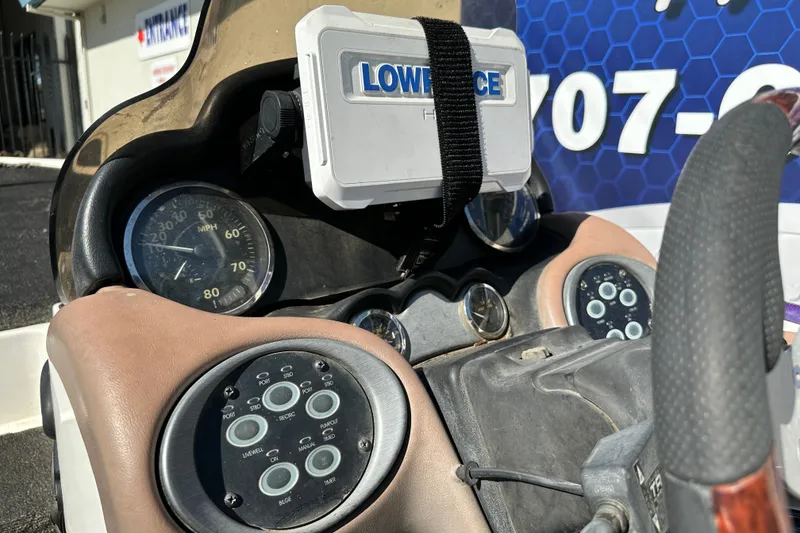 Slide: The Image of Dashboard of a 2006 Triton TR-21 boat with Lowrance GPS and gauges. - 16