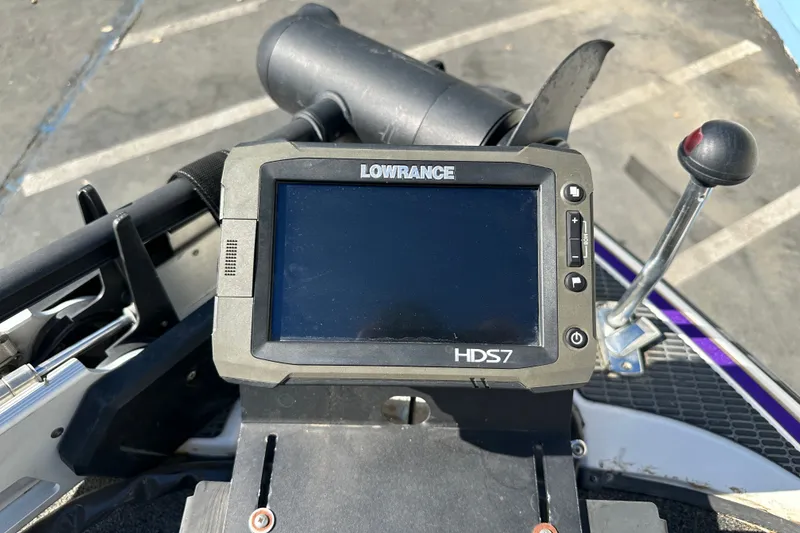 Slide: The Image of Lowrance HDS7 fishfinder on a 2006 Triton TR-21 boat dashboard. - 10
