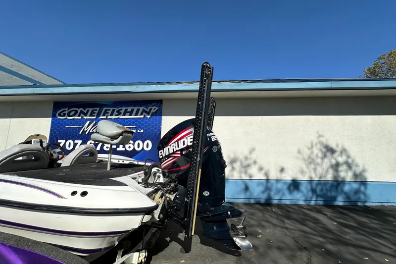 Slide: The Image of 2006 Triton TR-21 boat with Evinrude engine at Gone Fishin' Marine dealership. - 6