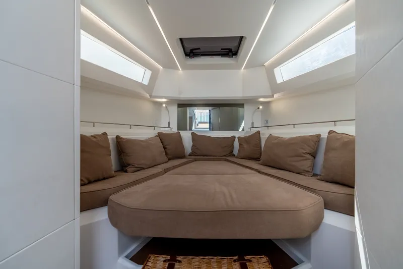 Slide: The Image of Luxurious interior of 2023 Evo Yachts R4 WA with plush seating and modern design. - 27