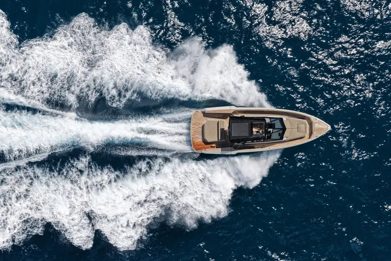 Slide: The Image of Aerial view of 2023 Evo Yachts R4 WA cruising on open sea. - 23