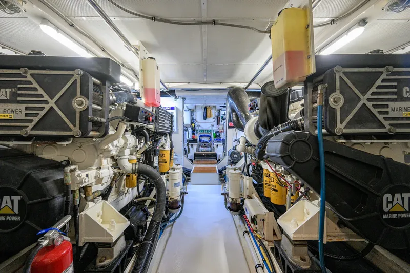 Slide: The Image of Engine room of 2008 Grand Banks 72 Aleutian RP yacht, featuring dual CAT marine engines. - 49