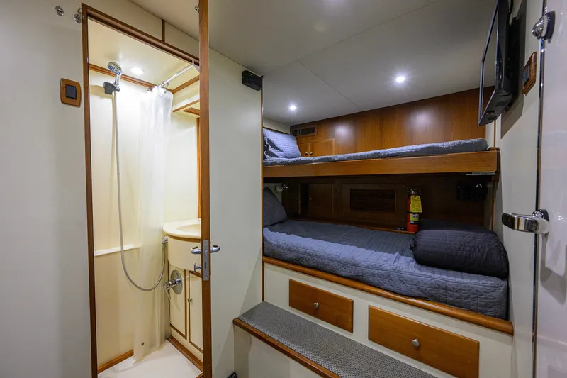 Slide: The Image of Cozy cabin with bunk beds and ensuite bathroom on 2008 Grand Banks 72 Aleutian RP yacht. - 43