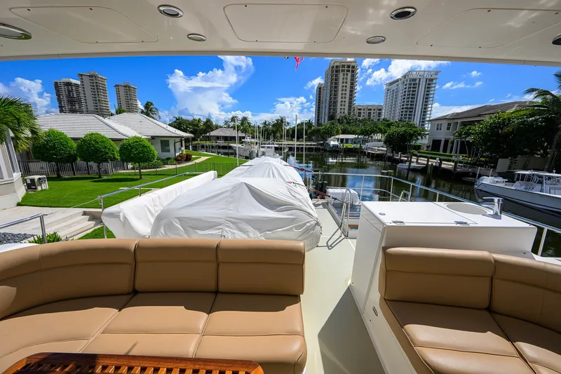 Slide: The Image of Luxurious 2008 Grand Banks 72 Aleutian RP yacht docked in a scenic marina setting. - 39