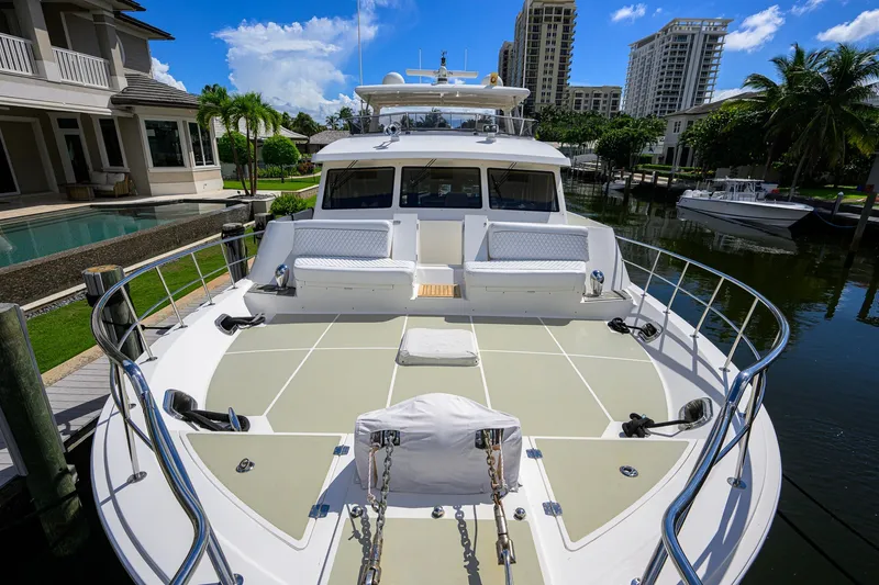Slide: The Image of 2008 Grand Banks 72 Aleutian RP yacht docked in a luxurious waterfront setting. - 36