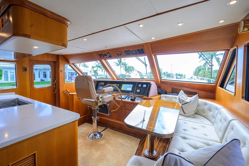 Slide: The Image of Luxurious interior of 2008 Grand Banks 72 Aleutian RP yacht with helm and seating area. - 13