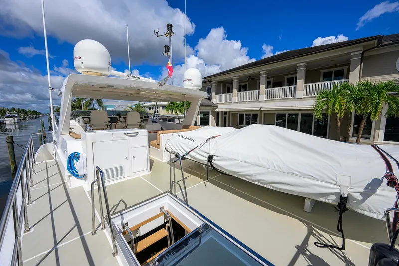 Slide: The Image of 2008 Grand Banks 72 Aleutian RP yacht docked near waterfront property. - 37