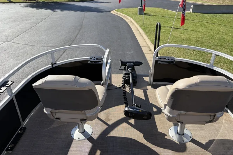 Slide: The Image of 2021 Sun Tracker Bass Buggy 16 DLX pontoon boat with dual seats and trolling motor. - 13
