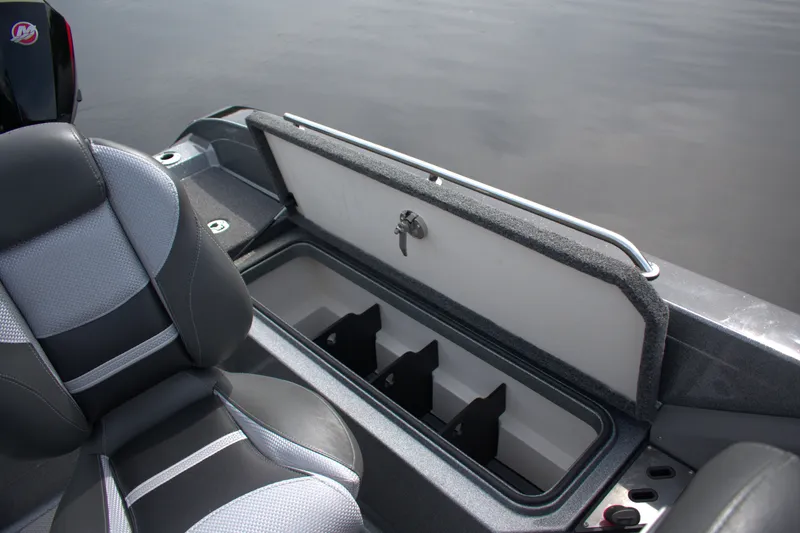 Slide: The Image of 2023 Ranger 622FS Pro boat interior with open storage compartment and seating. - 21