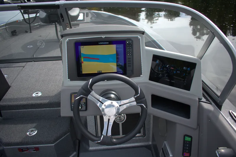 Slide: The Image of 2023 Ranger 622FS Pro boat dashboard with advanced navigation and control systems. - 17
