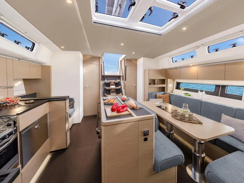 Slide: The Image of Modern interior of 2024 Hanse 510 yacht with spacious kitchen and dining area. - 5
