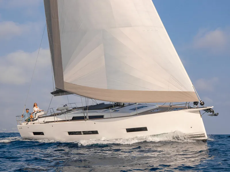 Slide: The Image of 2024 Hanse 510 sailboat cruising on open water. - 7