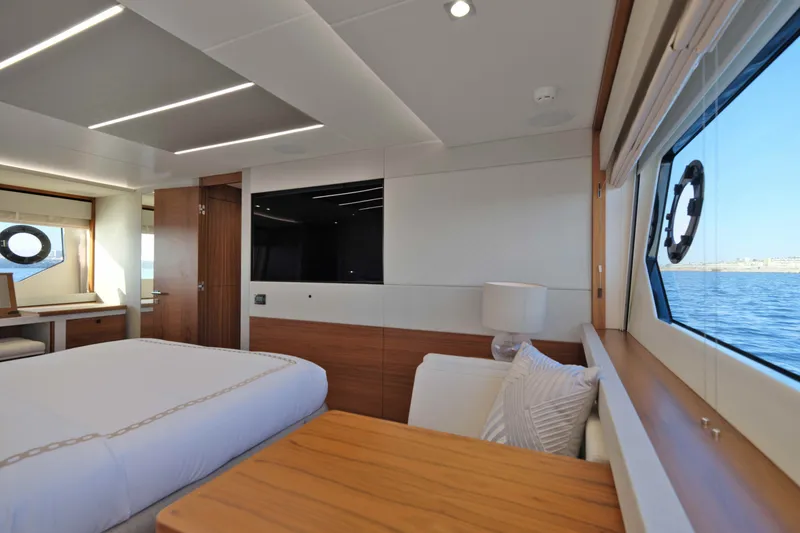 Slide: The Image of Luxurious interior of 2018 Sunseeker 76 Yacht with ocean view and modern furnishings. - 75