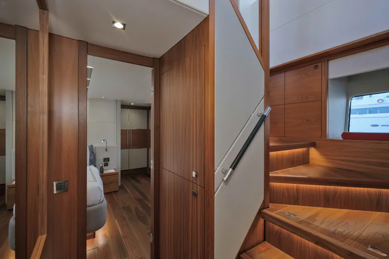 Slide: The Image of Luxurious interior of 2018 Sunseeker 76 Yacht featuring elegant wood finishes and modern design. - 48