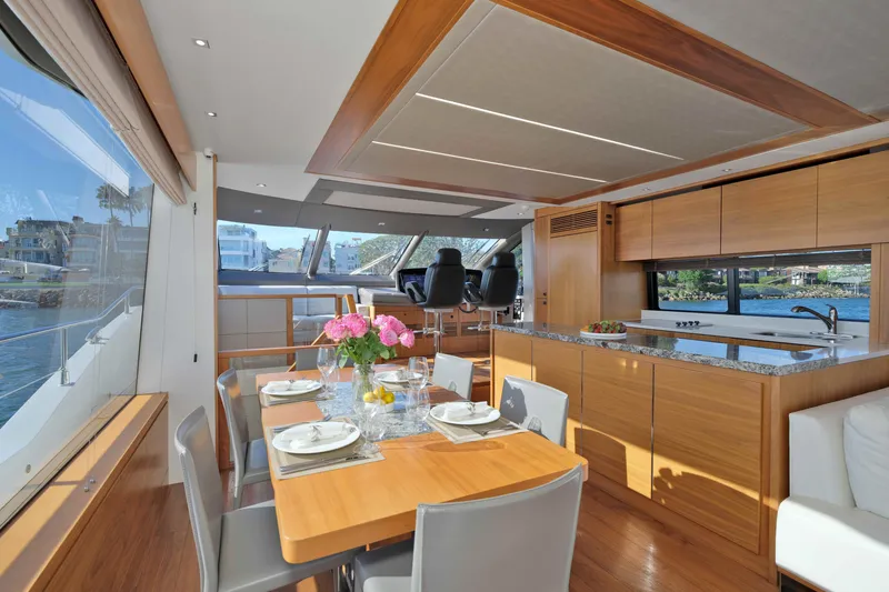 Slide: The Image of Luxurious interior of 2018 Sunseeker 76 Yacht with elegant dining area and modern kitchen. - 16