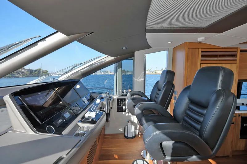 Slide: The Image of Luxurious interior of 2018 Sunseeker 76 Yacht with modern helm and leather seating. - 29