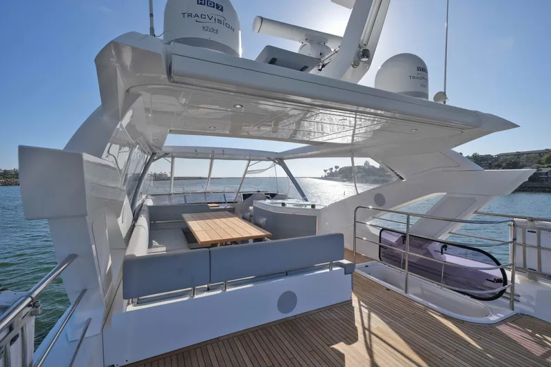 Slide: The Image of Luxurious 2018 Sunseeker 76 Yacht with spacious deck and elegant seating area. - 36
