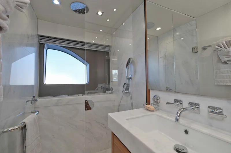 Slide: The Image of Luxurious bathroom interior of 2018 Sunseeker 76 Yacht with modern fixtures and marble finish. - 70