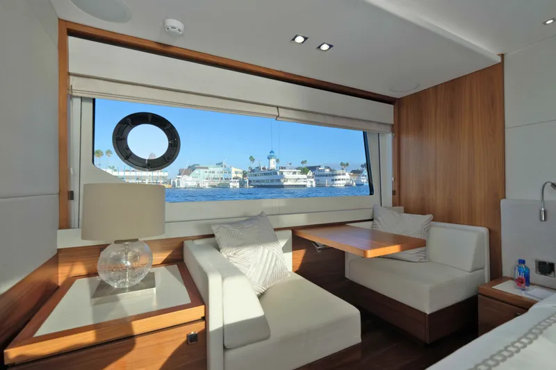 Slide: The Image of Luxurious interior of 2018 Sunseeker 76 Yacht with waterfront view through large window. - 68
