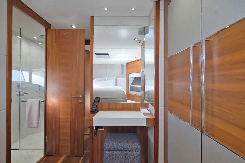 Slide: The Image of Luxurious interior of 2018 Sunseeker 76 Yacht featuring elegant wood finishes and modern design. - 62