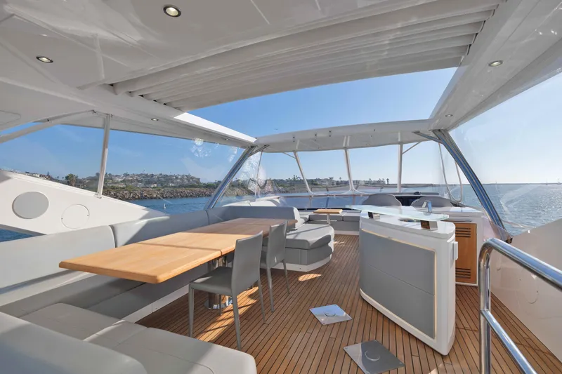 Slide: The Image of Luxurious 2018 Sunseeker 76 Yacht interior with elegant seating and ocean view. - 38