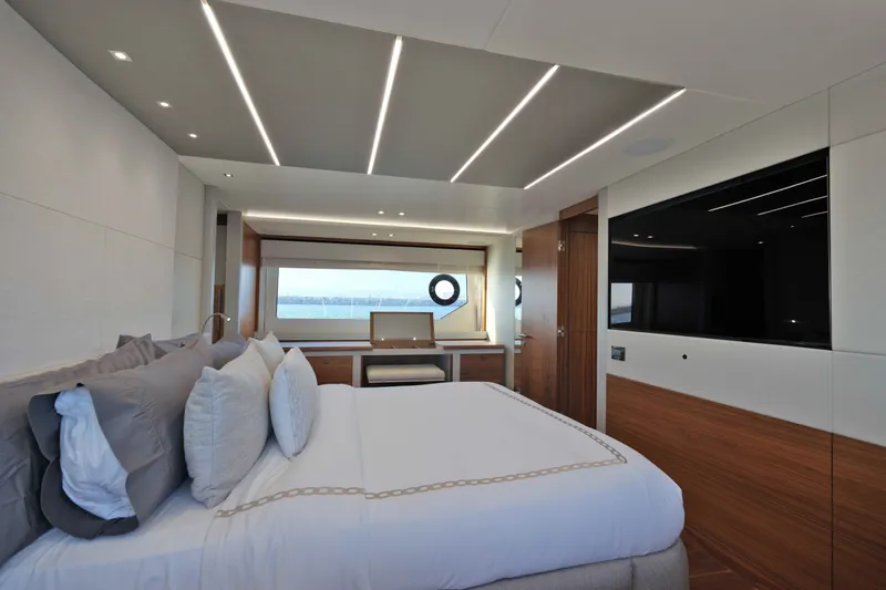 Slide: The Image of Luxurious bedroom interior of 2018 Sunseeker 76 Yacht with modern design and ocean view. - 76